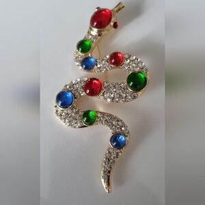 Stunnibg  Goldtone Snake Brooch with Multicolor Gems